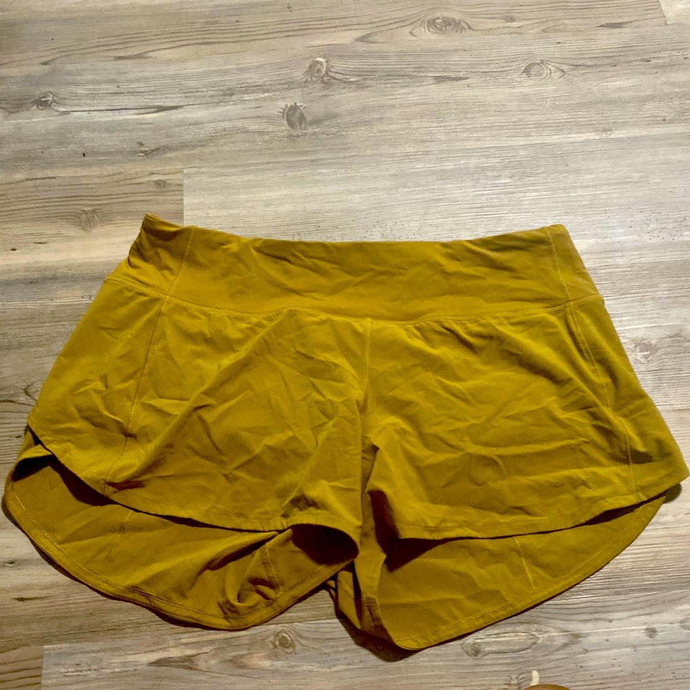 Lululemon 10 Tall. Speed Shorts. Limited edition gold color.